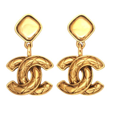 chanel quilted style dangle earrings